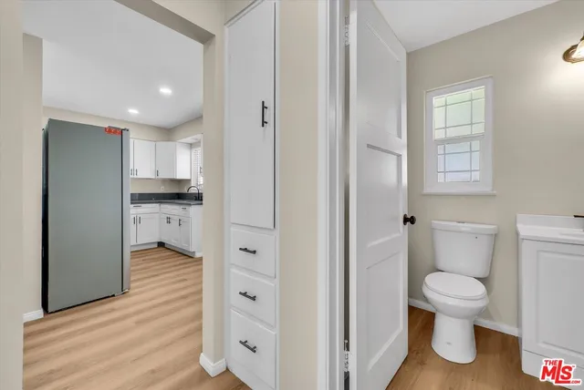 a bathroom with a toilet sink and bathtub