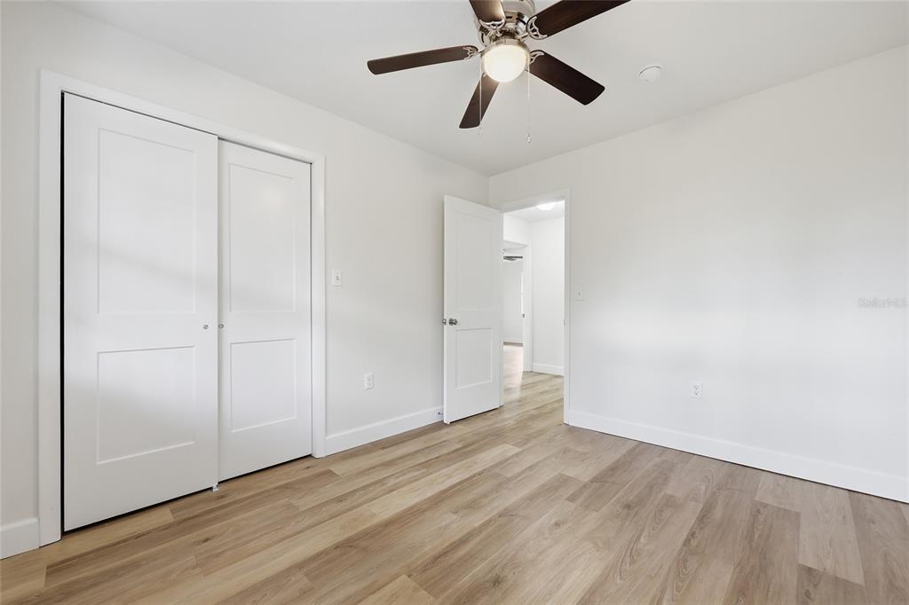 129 Southwest Benz Way Lake City, FL 32024 - Photo 19 of 30 wooden floor in an empty room