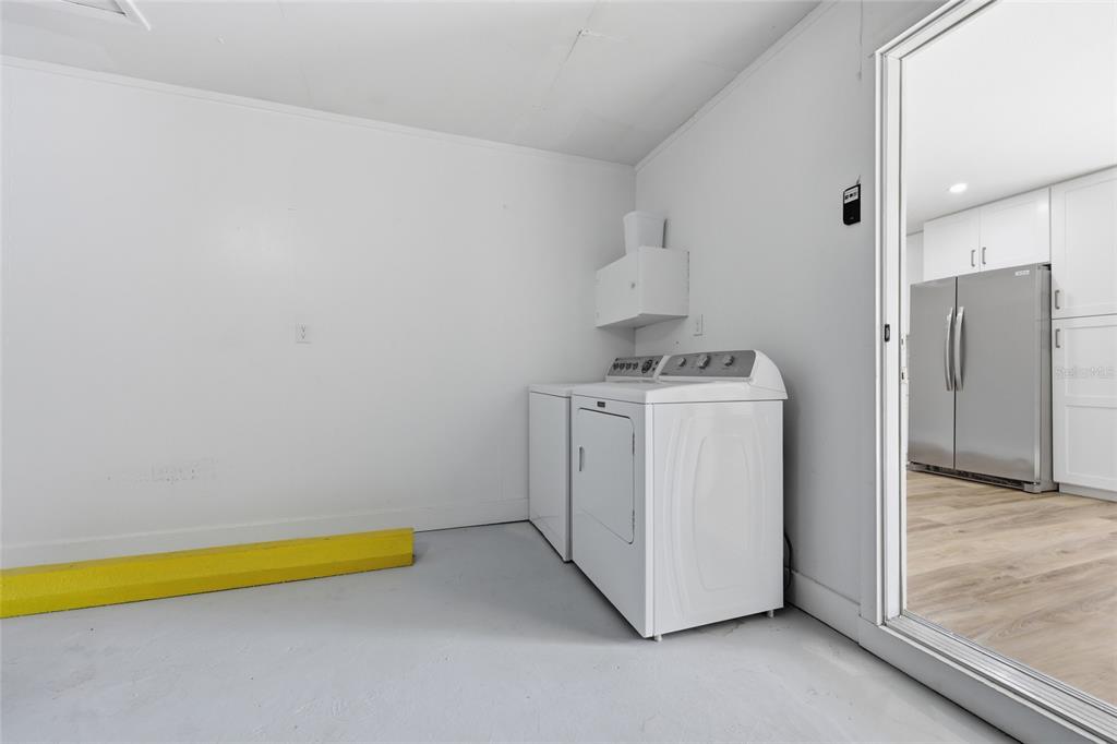 129 Southwest Benz Way Lake City, FL 32024 - Photo 20 of 30 a utility room with dryer and washer