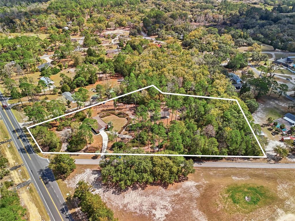 129 Southwest Benz Way Lake City, FL 32024 - Photo 29 of 30 view of a balcony with wooden floor