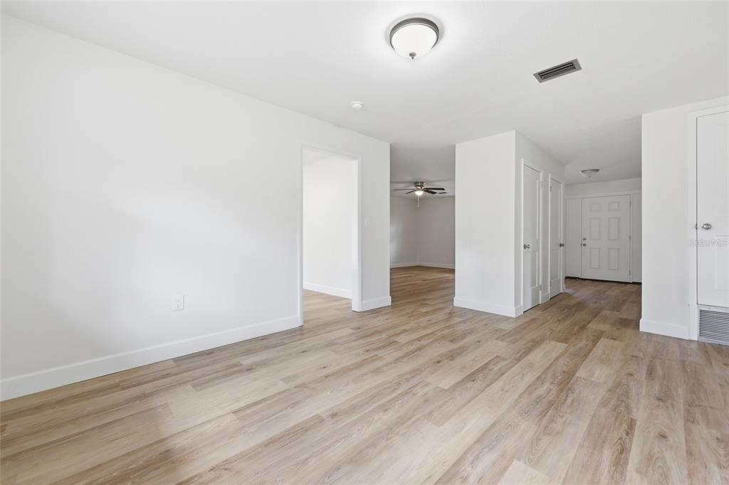 129 Southwest Benz Way Lake City, FL 32024 - Photo 6 of 30 a view of a room with wooden floor