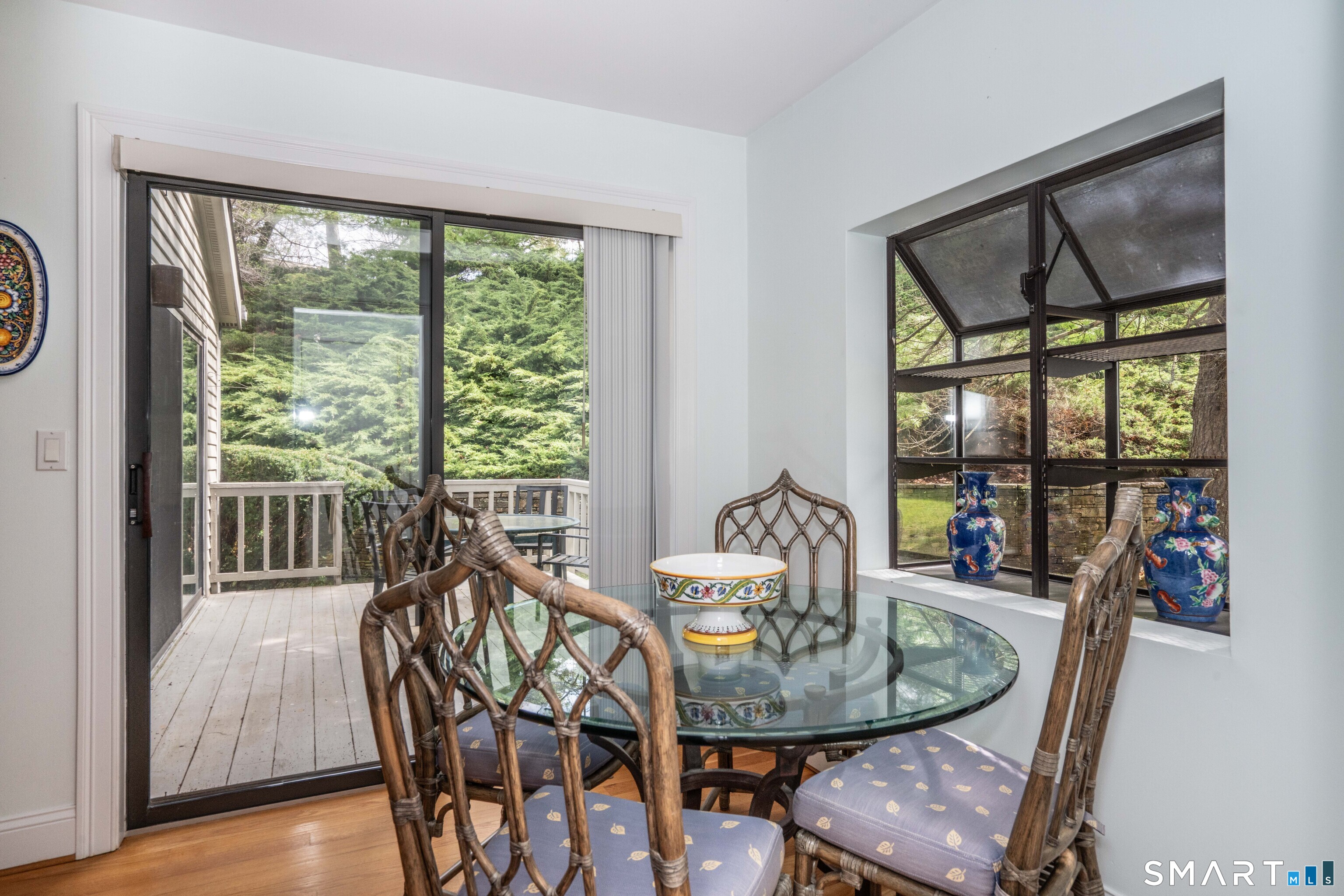 3 Morgan Place, Unit 3 Avon, CT 06001 - Photo 11 of 29 a dining room with furniture water view and wooden floor