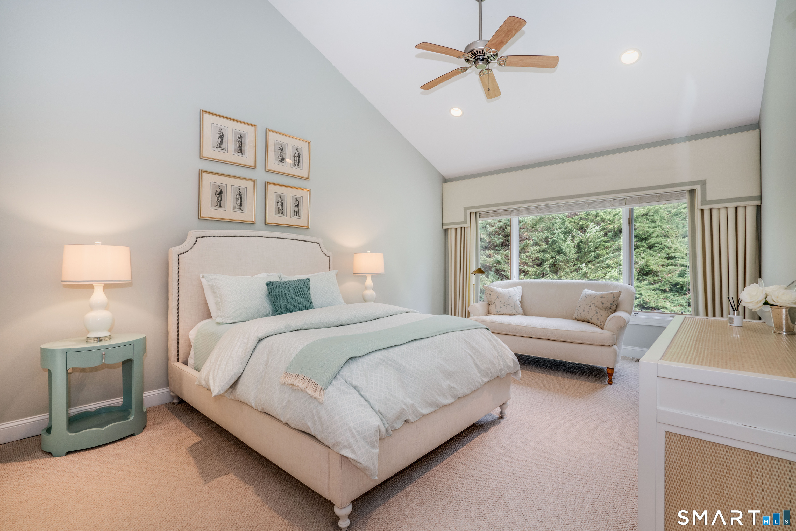 3 Morgan Place, Unit 3 Avon, CT 06001 - Photo 16 of 29 a bedroom with a large bed and a chandelier