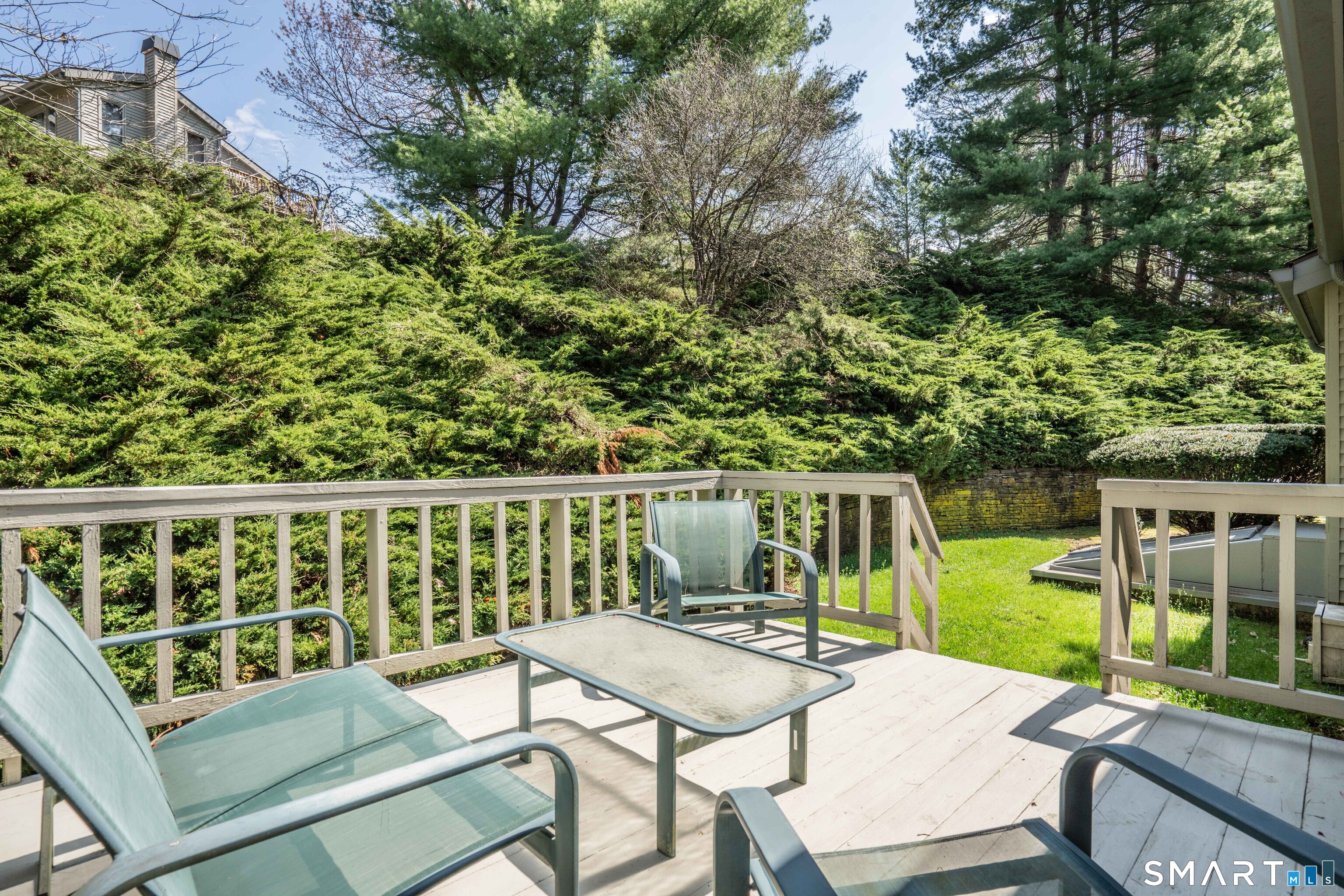 3 Morgan Place, Unit 3 Avon, CT 06001 - Photo 25 of 29 a view of a patio with two chairs and a table