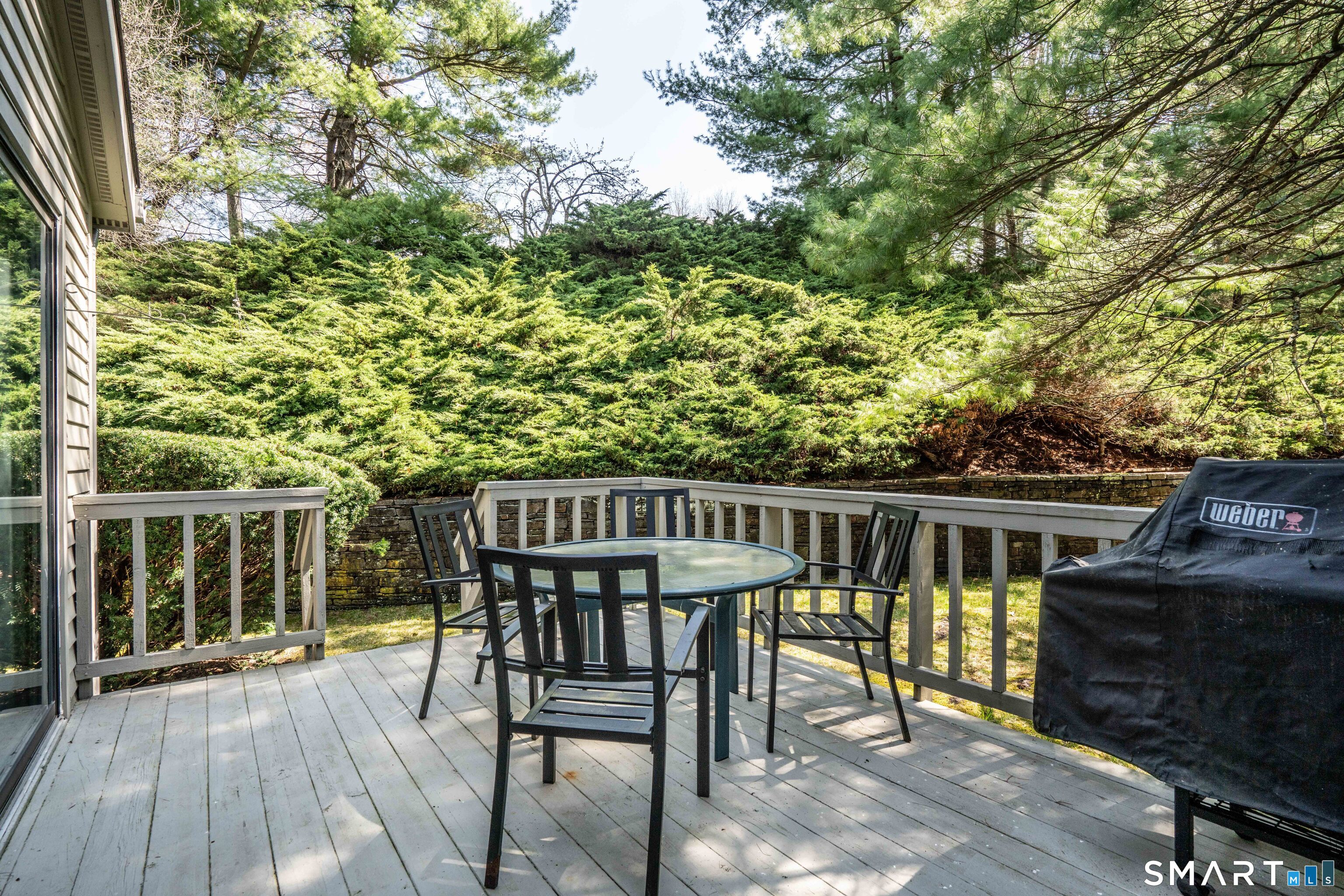 3 Morgan Place, Unit 3 Avon, CT 06001 - Photo 26 of 29 a view of balcony with wooden floor and outdoor seating