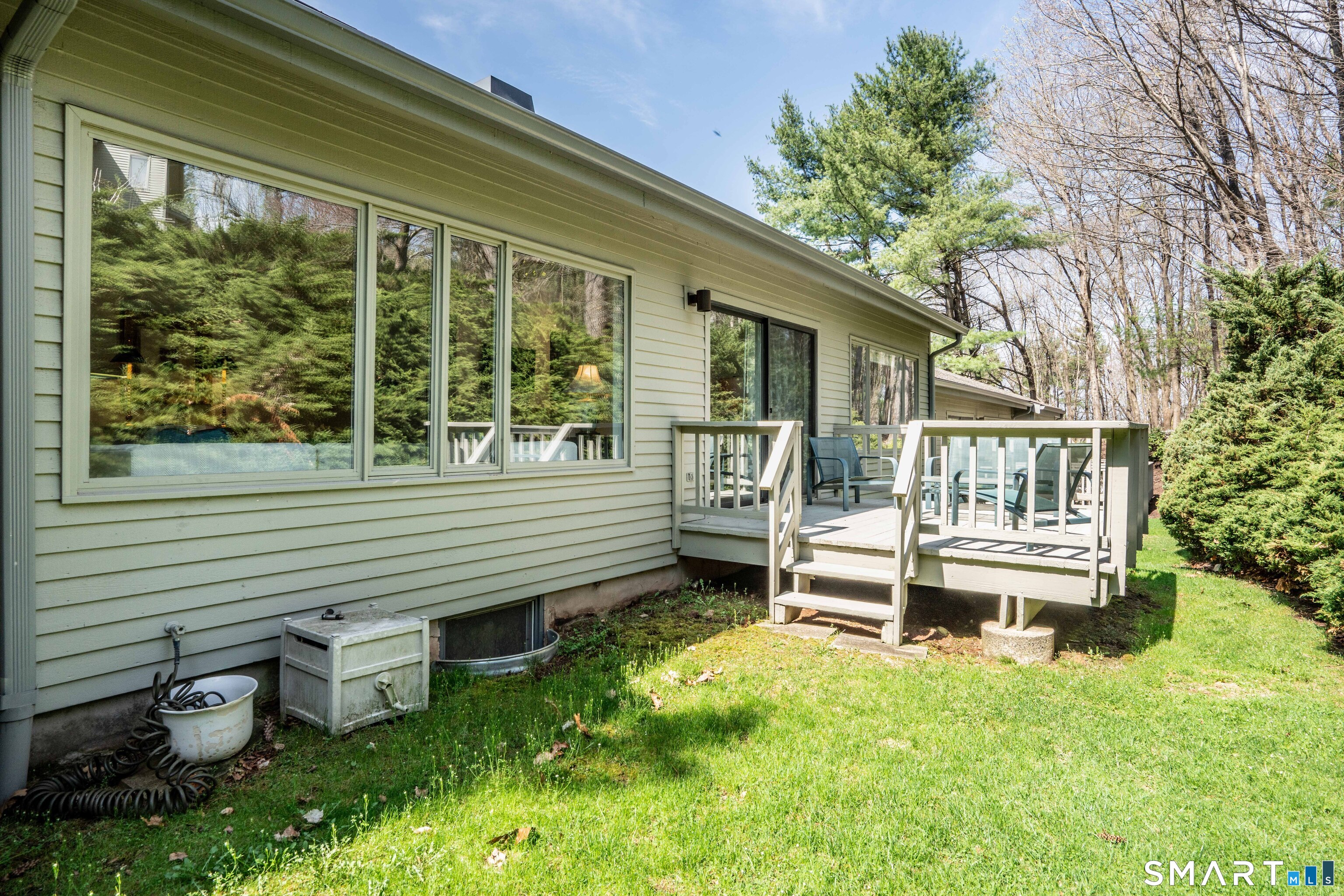 3 Morgan Place, Unit 3 Avon, CT 06001 - Photo 27 of 29 a view of a house with backyard and a garden