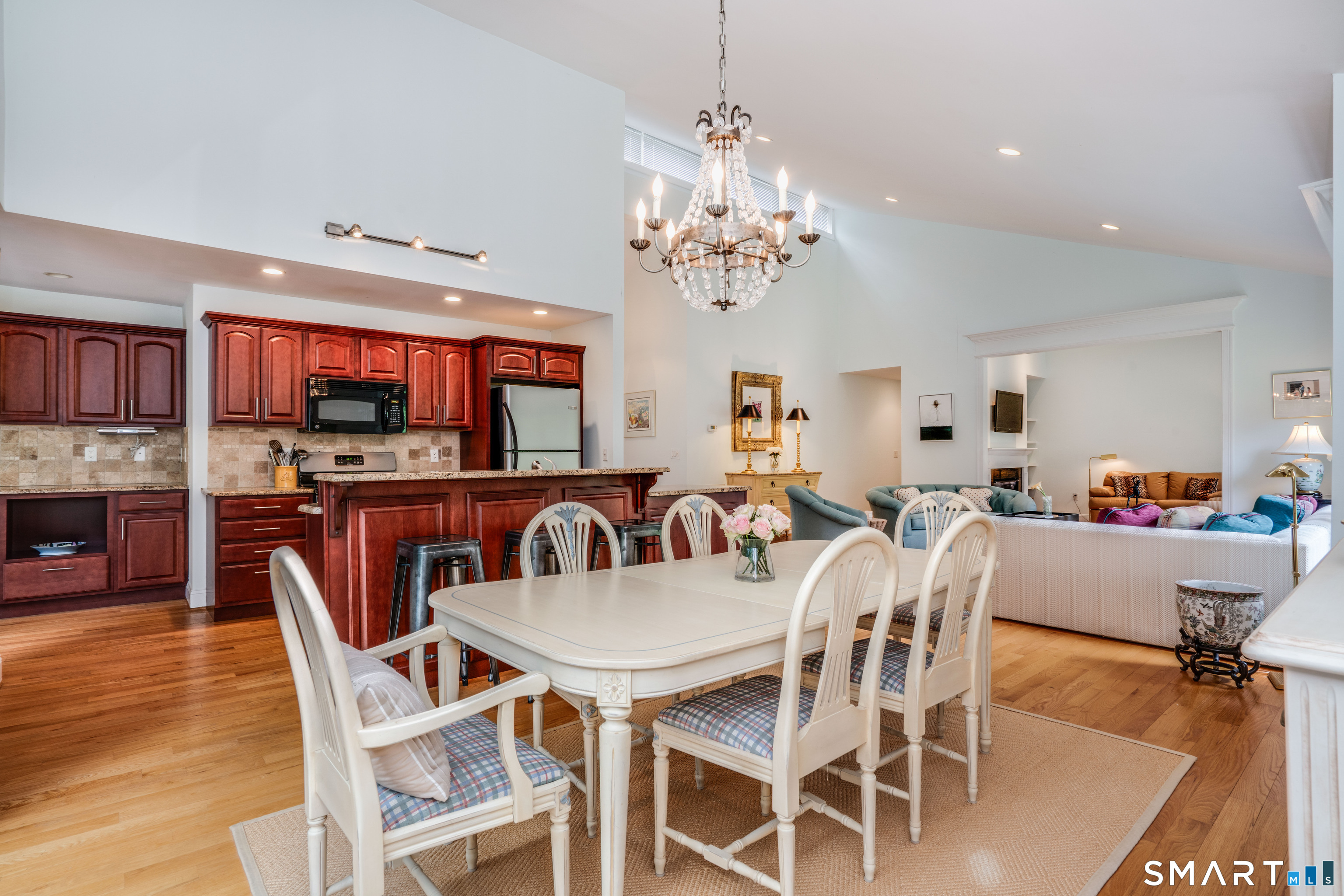 3 Morgan Place, Unit 3 Avon, CT 06001 - Photo 5 of 29 a view of a dining room with furniture and wooden floor