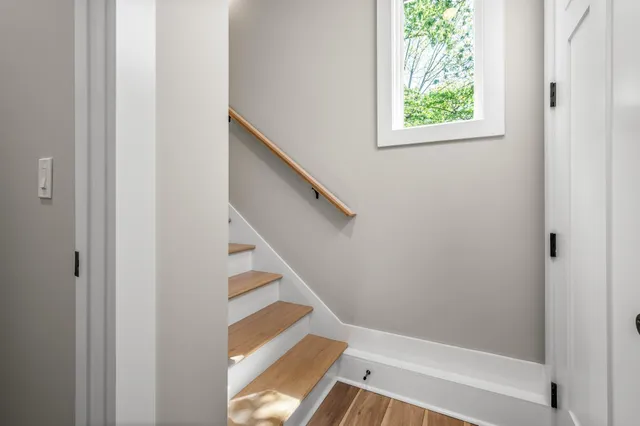 a view of entryway with a bathtub