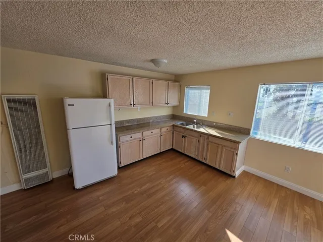 a view of a swimming pool with outdoor seating