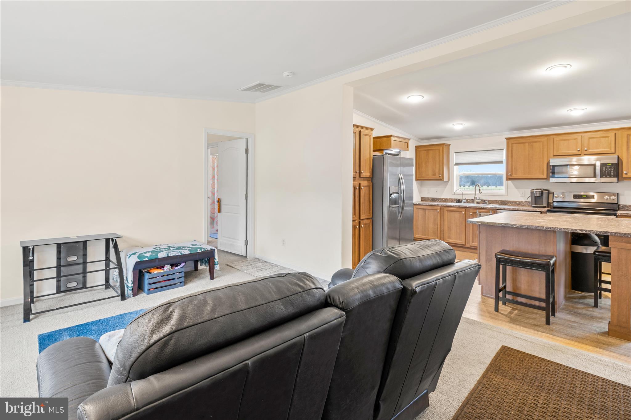 679 Oak Hill School Road Townsend, DE 19734 - Photo 4 of 50 a living room with furniture and a table