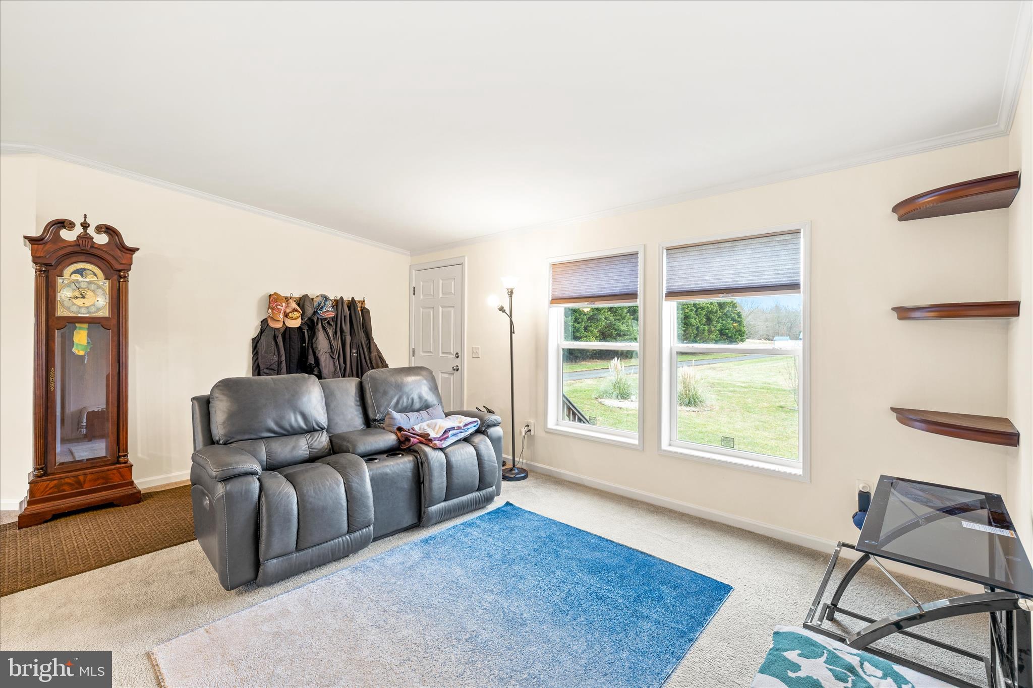 679 Oak Hill School Road Townsend, DE 19734 - Photo 6 of 50 a living room with furniture and a window