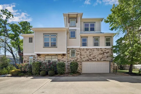 front view of a house with a bench