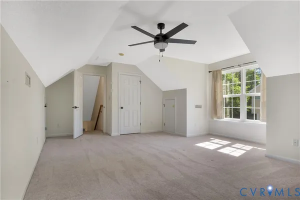 a view of empty room with windows