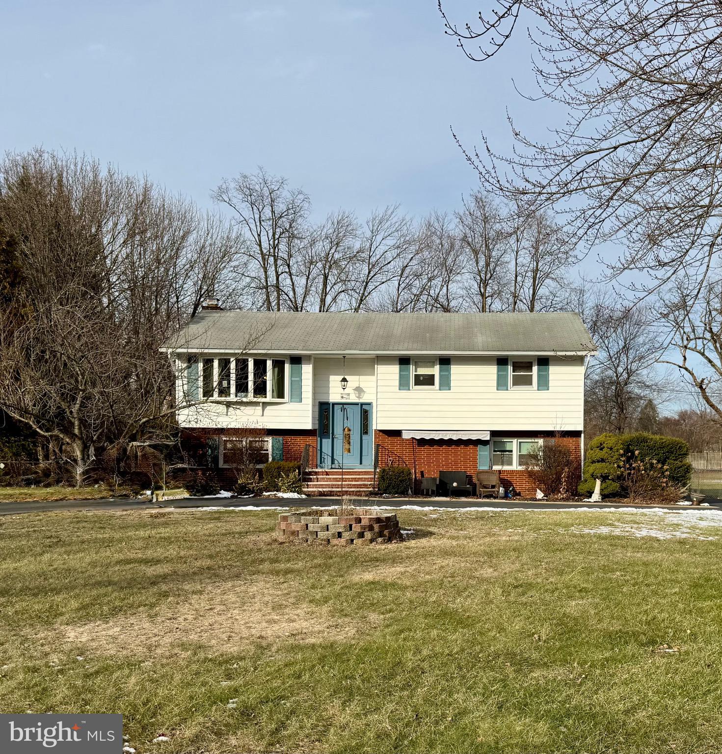 102 Sunset Road Burlington, NJ 08016 - Photo 3 of 18 a front view of residential houses with yard and trees