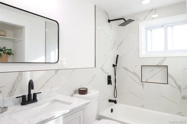 a bathroom with a sink and a shower