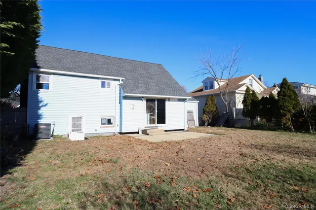 a view of a house with a snow in the yard