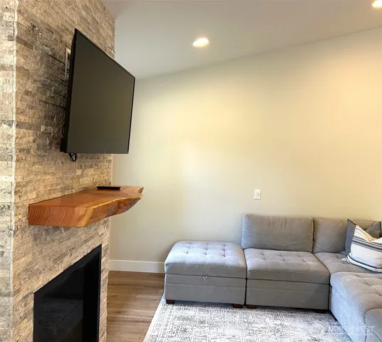 a living room with a couch and a flat screen tv