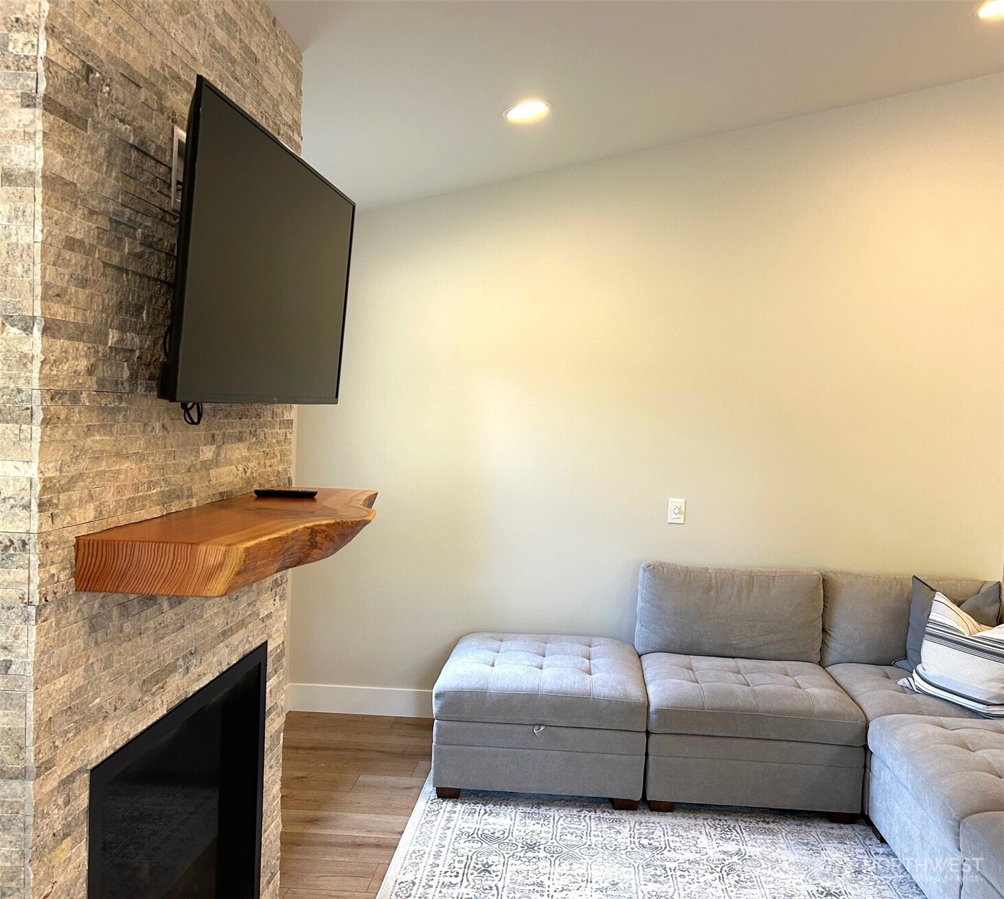 3016 Memory Lane Leavenworth, WA 98826 - Photo 7 of 19 a living room with a couch and a flat screen tv