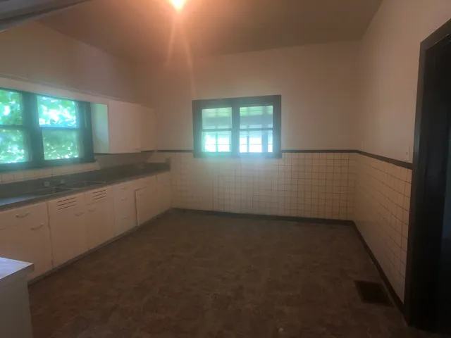 an empty room with a window