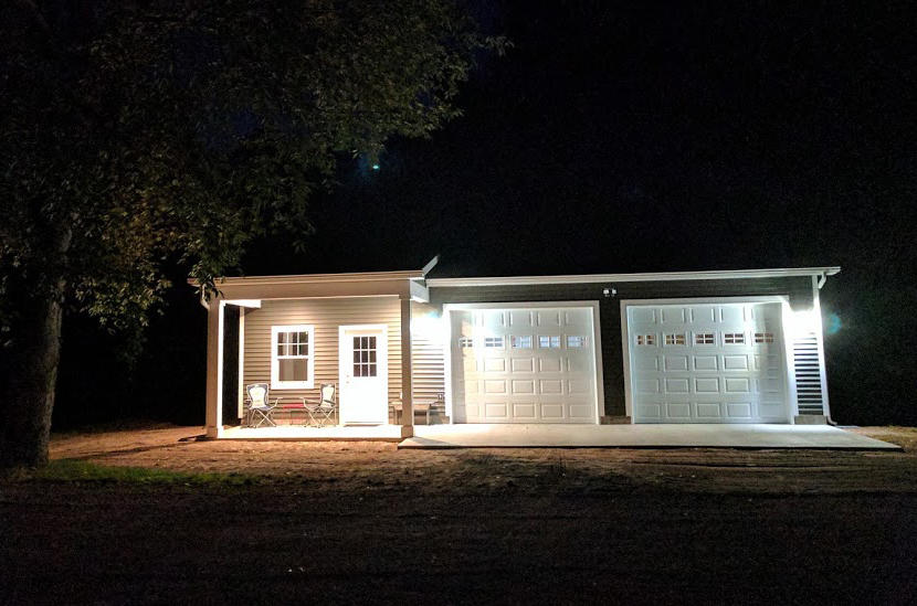 8980 Bayview Road Onekama, MI 49675 - Photo 30 of 45 Garage Lit up at night