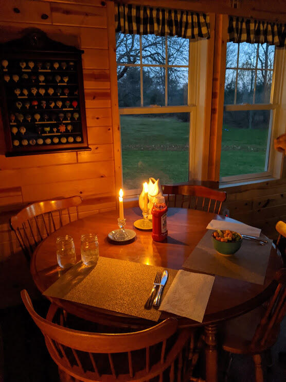 8980 Bayview Road Onekama, MI 49675 - Photo 9 of 45 Dinner in Sun Room 2