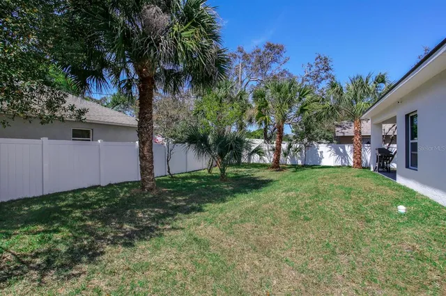 a view of a backyard with a garden
