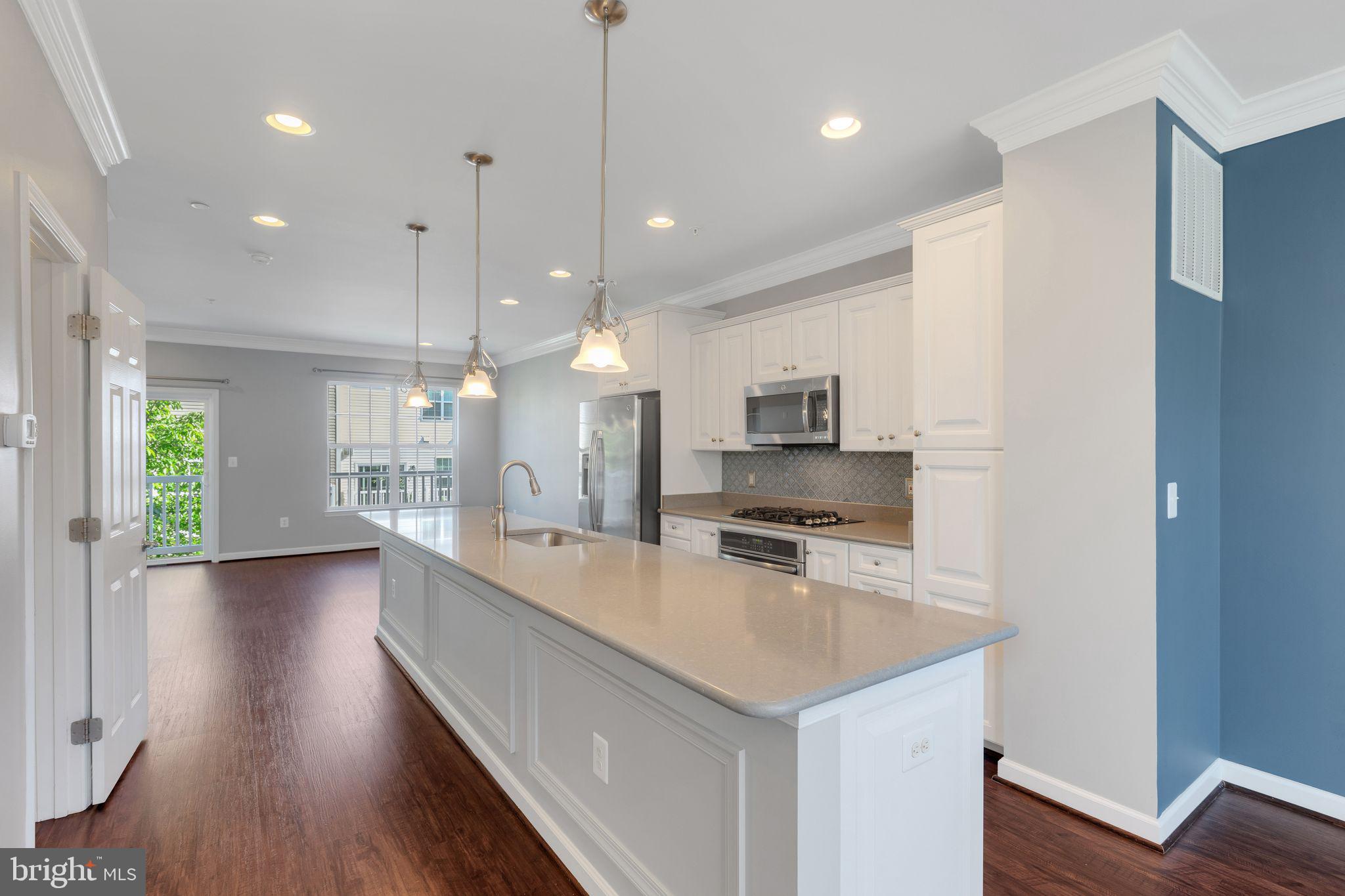 15713 Murphys Tin Street Silver Spring, MD 20906 - Photo 13 of 57 "Stormy Sky" honed quartz counter