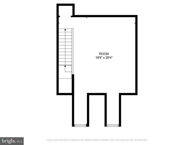 a couple of cars parked in front of a house