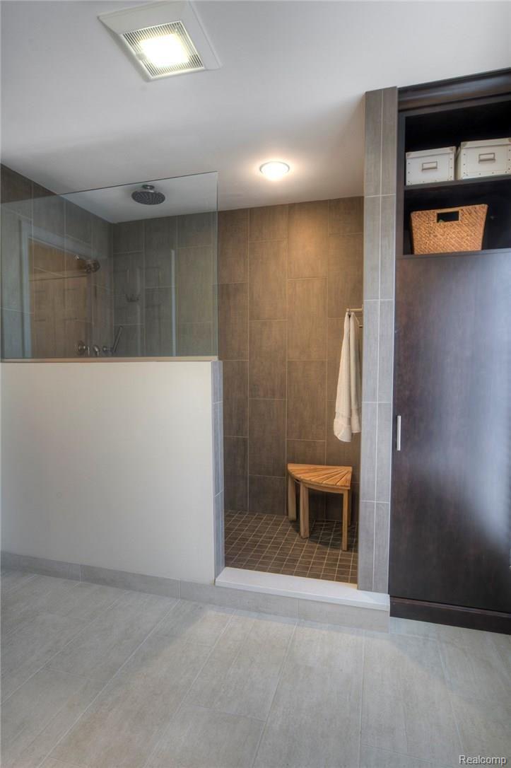 3140 Quail Ridge Circle Rochester, MI 48309 - Photo 32 of 45 With an enormous Walk In Shower, complete with Rain head, this Master Suite is like having your own private spa.