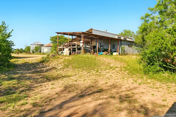 a view of a house with a swimming pool