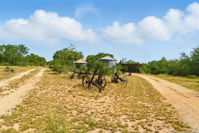 a view of a lake with a yard