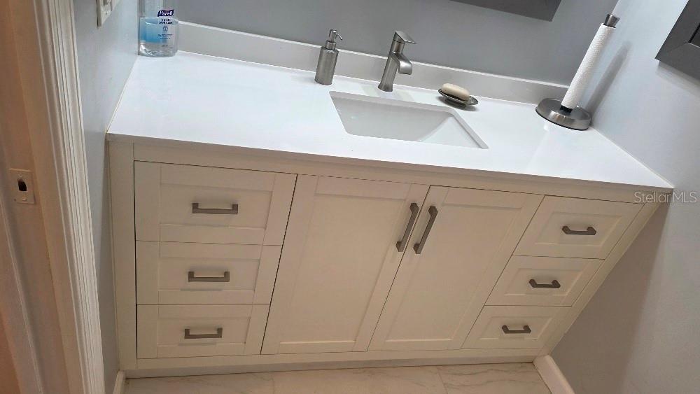 70 Furness Place Palm Coast, FL 32137 - Photo 18 of 30 a close view of a sink and tap