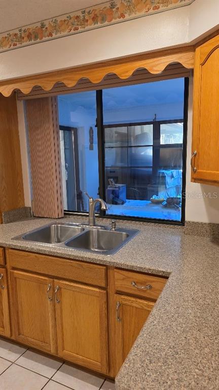 70 Furness Place Palm Coast, FL 32137 - Photo 28 of 30 a bathroom with a sink and a mirror