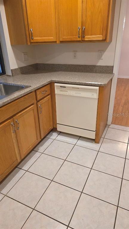 70 Furness Place Palm Coast, FL 32137 - Photo 29 of 30 a close view of a sink and cabinets in the kitchen