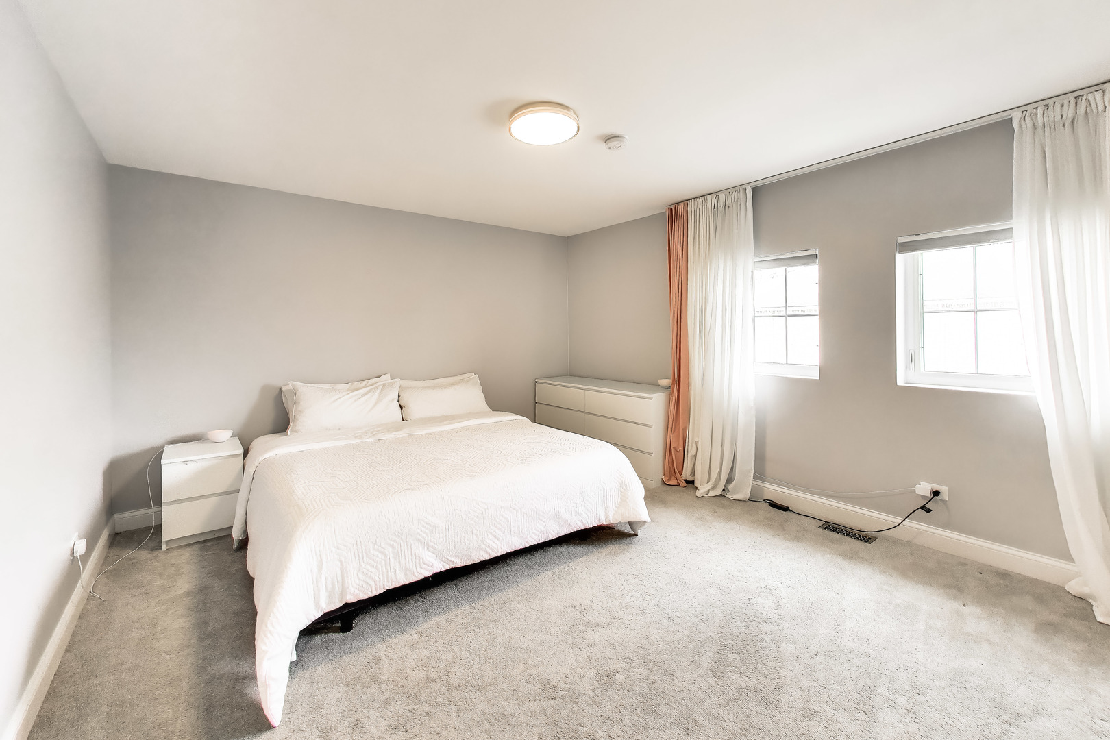 183 East River Road, Unit A3 Des Plaines, IL 60016 - Photo 12 of 21 a bedroom with a bed and window