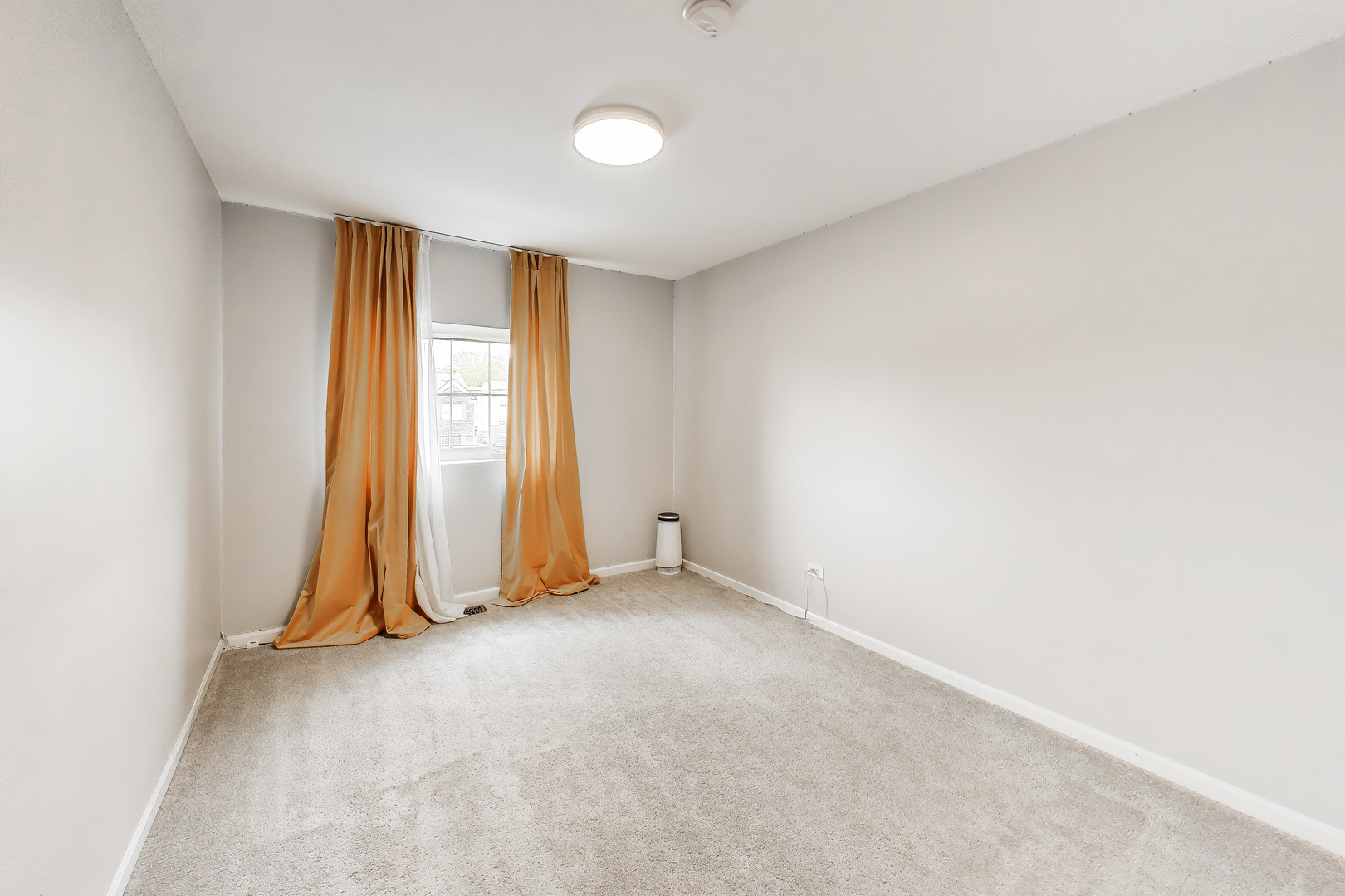 183 East River Road, Unit A3 Des Plaines, IL 60016 - Photo 18 of 21 an empty room with wooden floor and a window