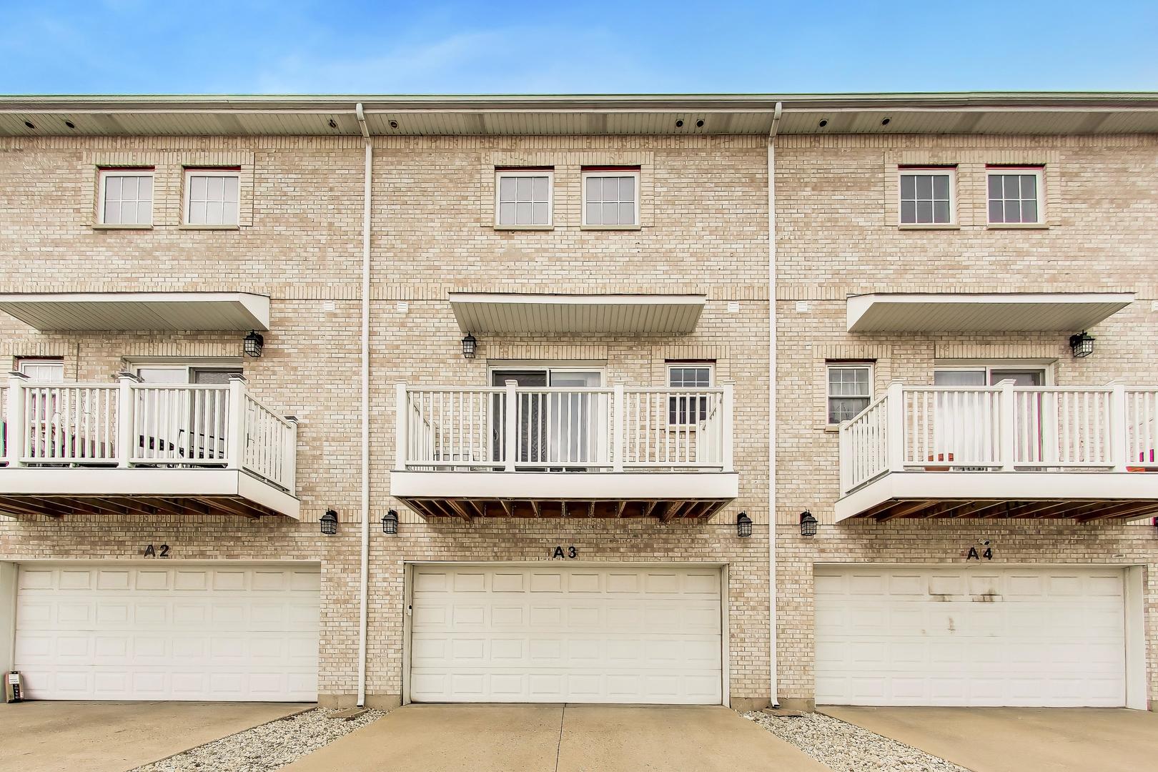 183 East River Road, Unit A3 Des Plaines, IL 60016 - Photo 21 of 21 front view of a building