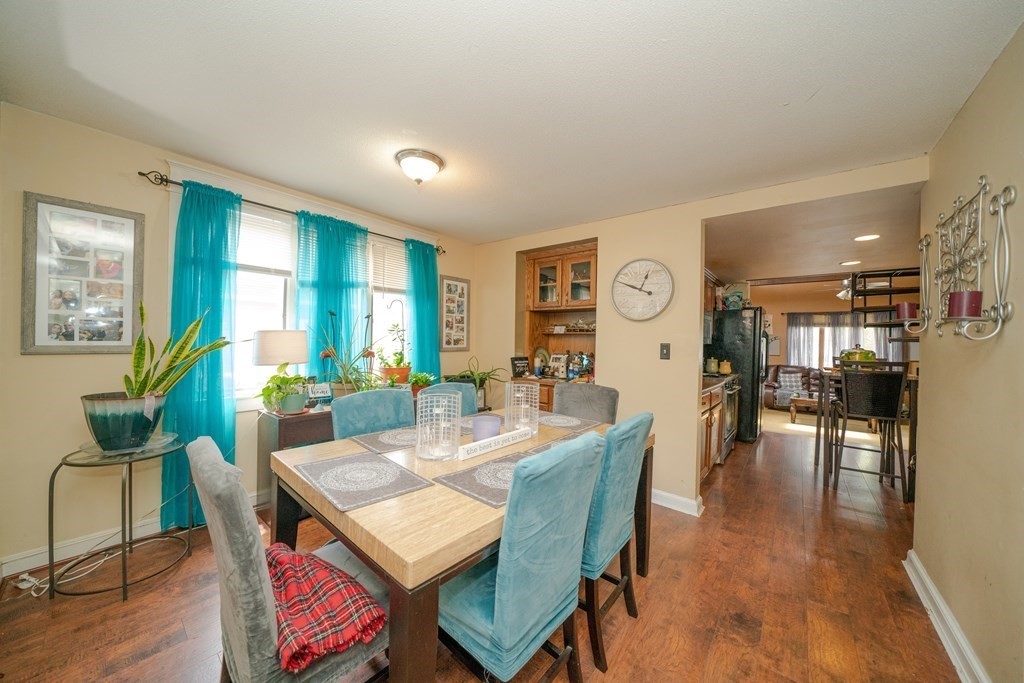 148 Gilbert Avenue Springfield, MA 01119 - Photo 14 of 35 a view of a dining room with furniture window and wooden floor