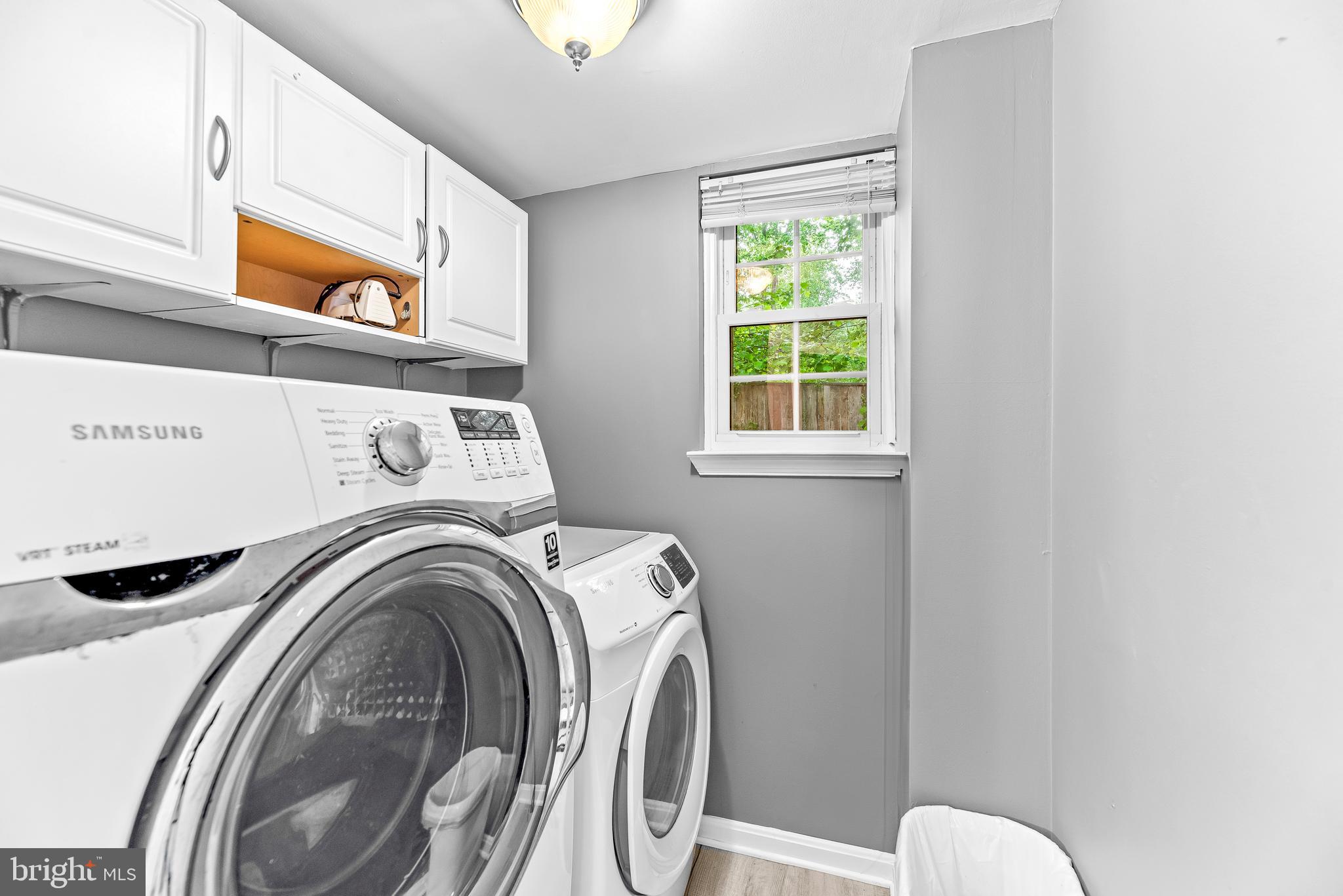8328 Ridge View Road Lusby, MD 20657 - Photo 25 of 34 a utility room with dryer and washer