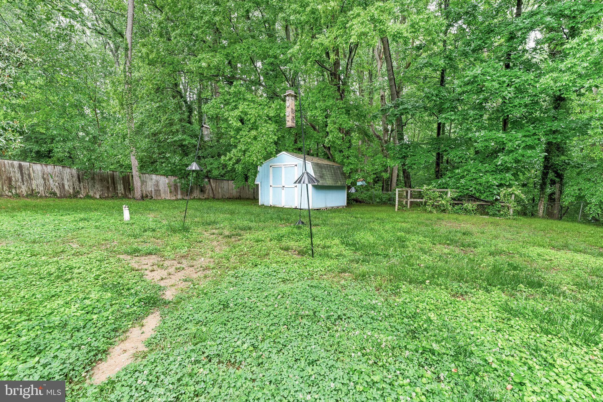 8328 Ridge View Road Lusby, MD 20657 - Photo 31 of 34 a backyard of a house with trampoline