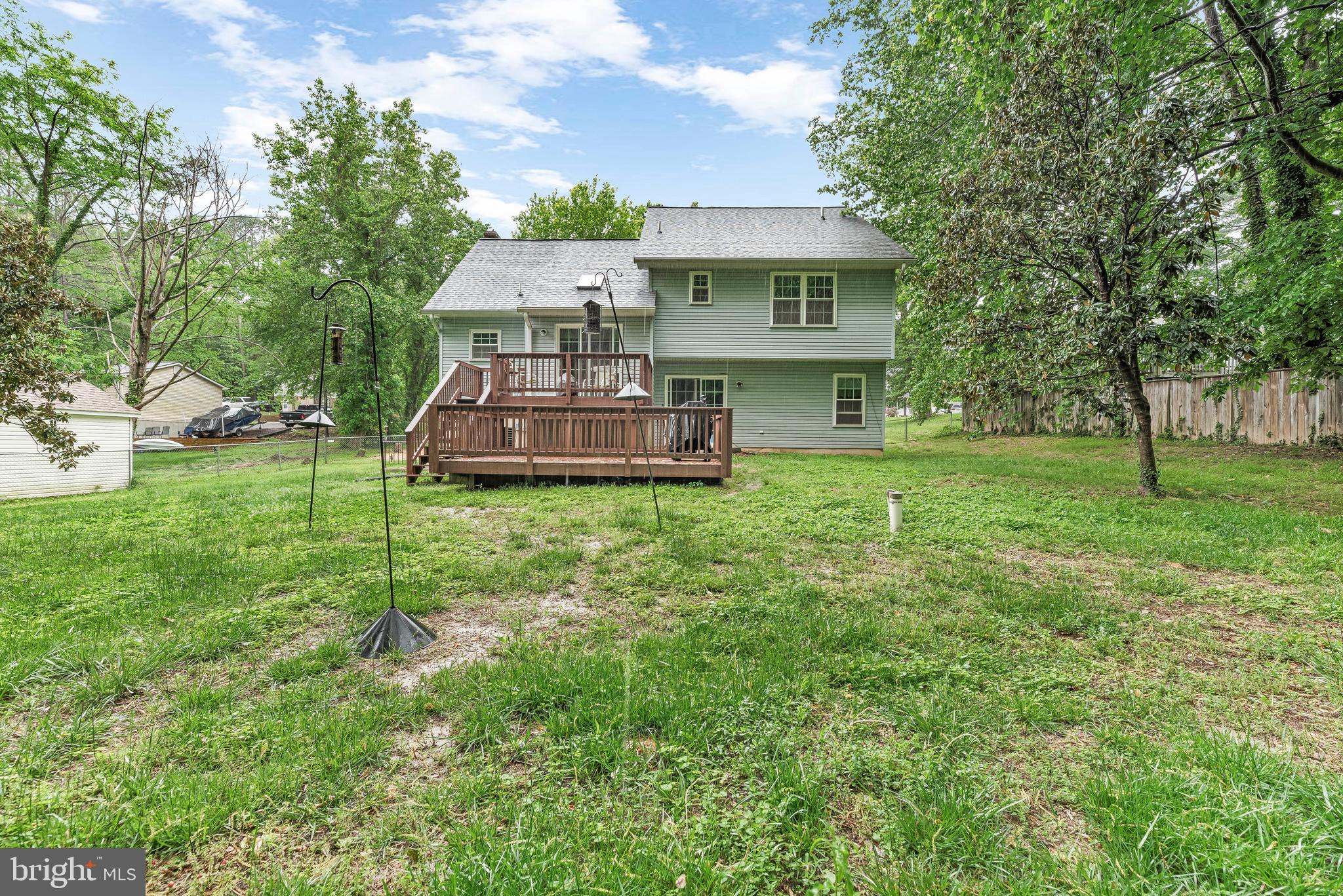 8328 Ridge View Road Lusby, MD 20657 - Photo 33 of 34 a aerial view of a house with a yard table and chairs