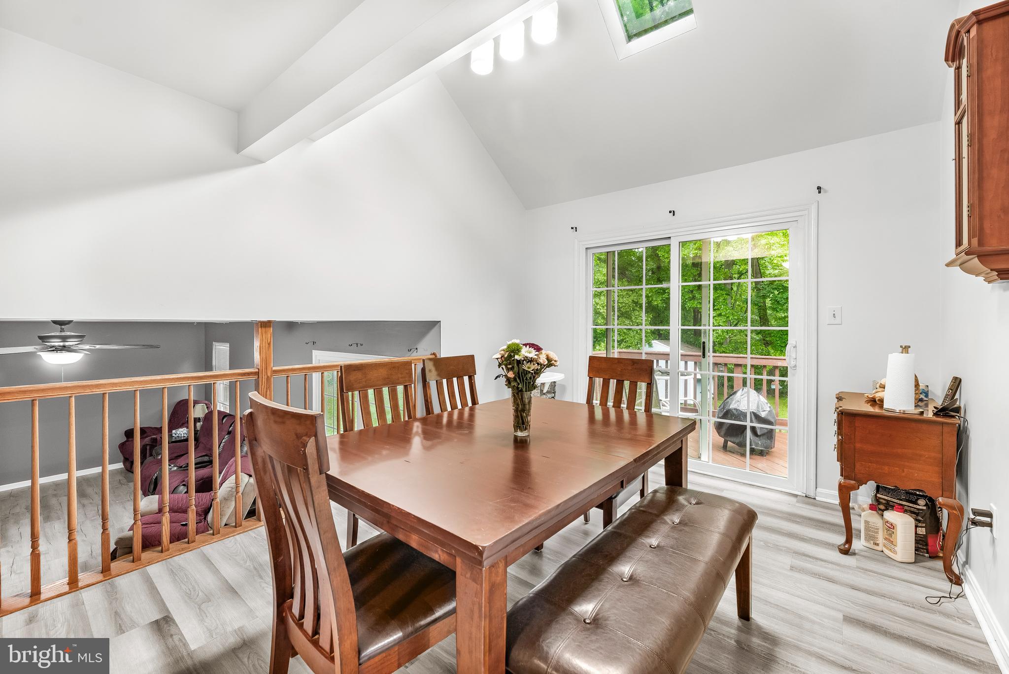 8328 Ridge View Road Lusby, MD 20657 - Photo 7 of 34 a view of a dining room with furniture window and wooden floor