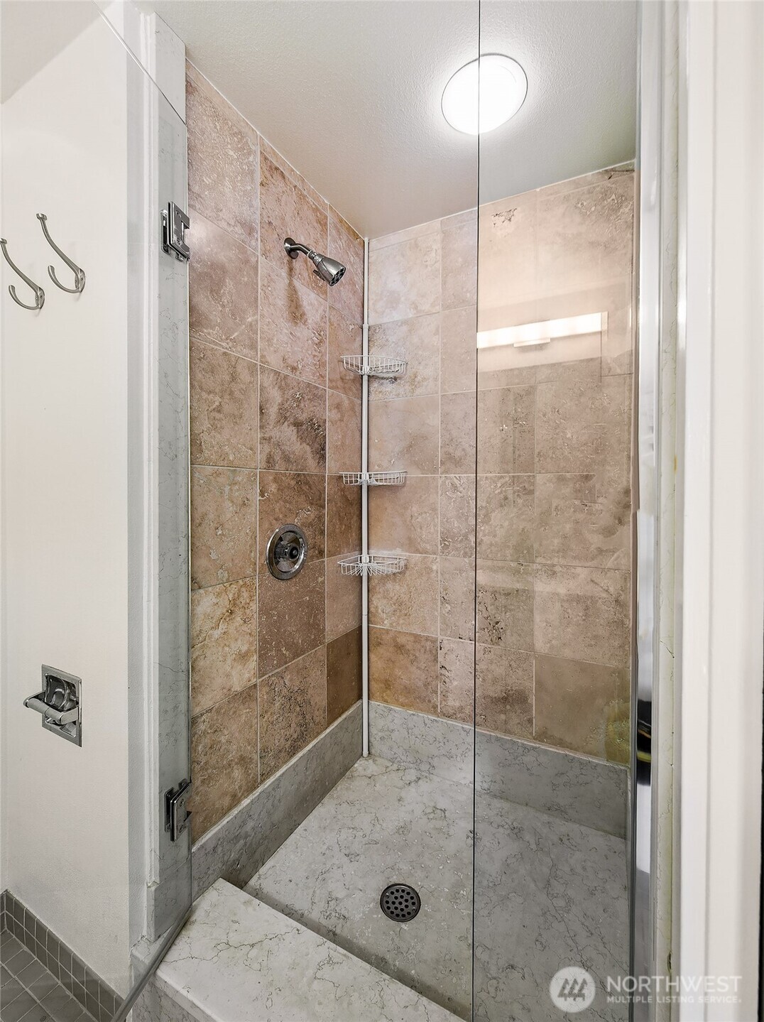 1101 Seneca Street, Unit 1301 Seattle, WA 98101 - Photo 16 of 40 a bathroom with a shower
