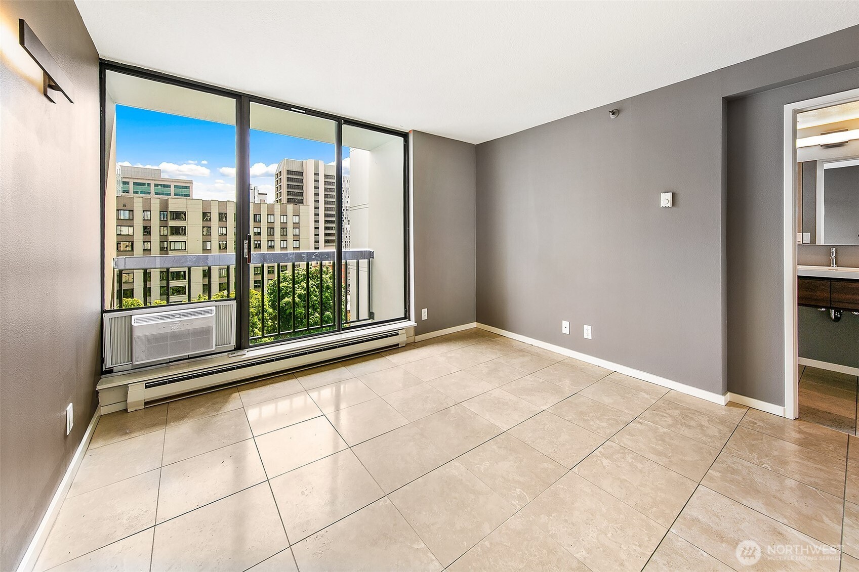 1101 Seneca Street, Unit 1301 Seattle, WA 98101 - Photo 18 of 40 a view of an empty room with a window