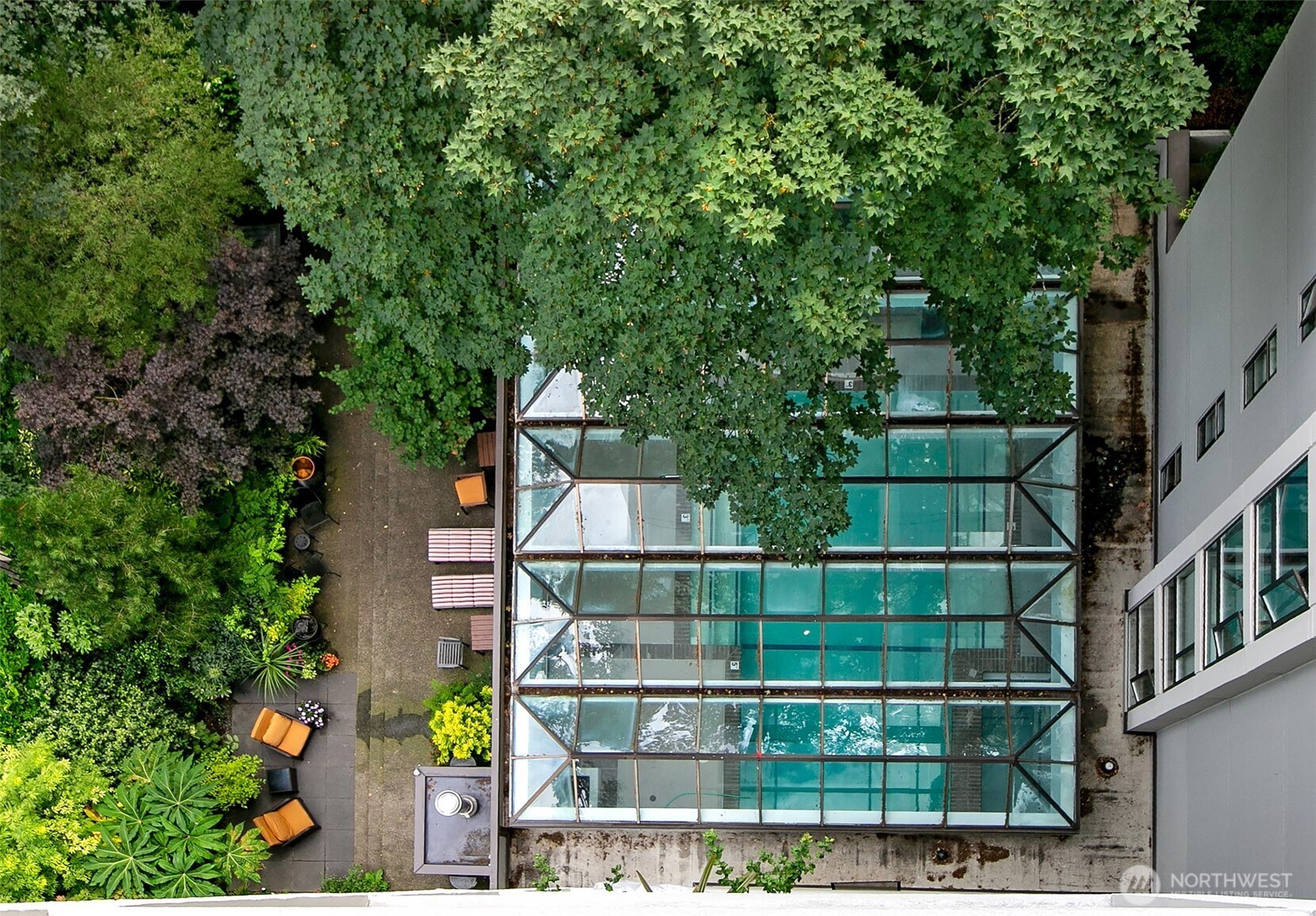 1101 Seneca Street, Unit 1301 Seattle, WA 98101 - Photo 19 of 40 an aerial view of a residential apartment building with a yard
