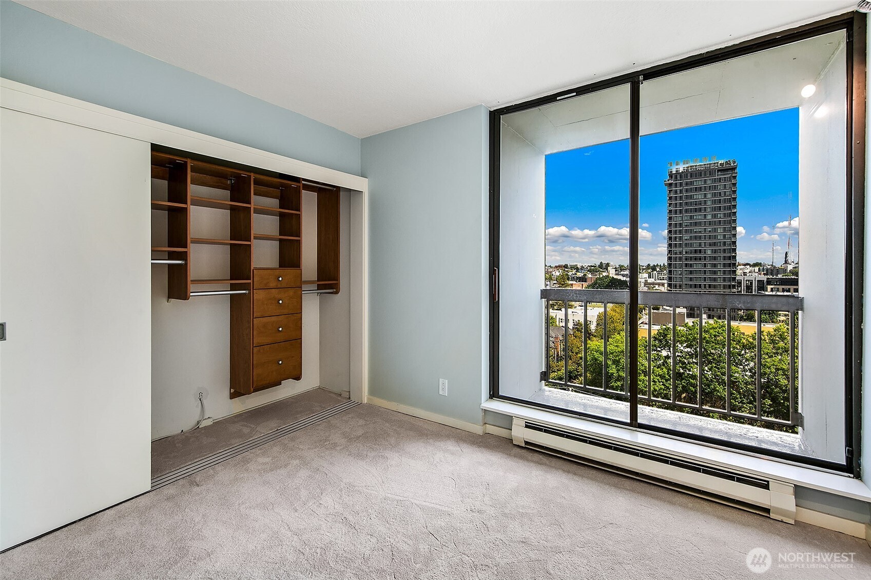 1101 Seneca Street, Unit 1301 Seattle, WA 98101 - Photo 20 of 40 a view of an empty room with a window
