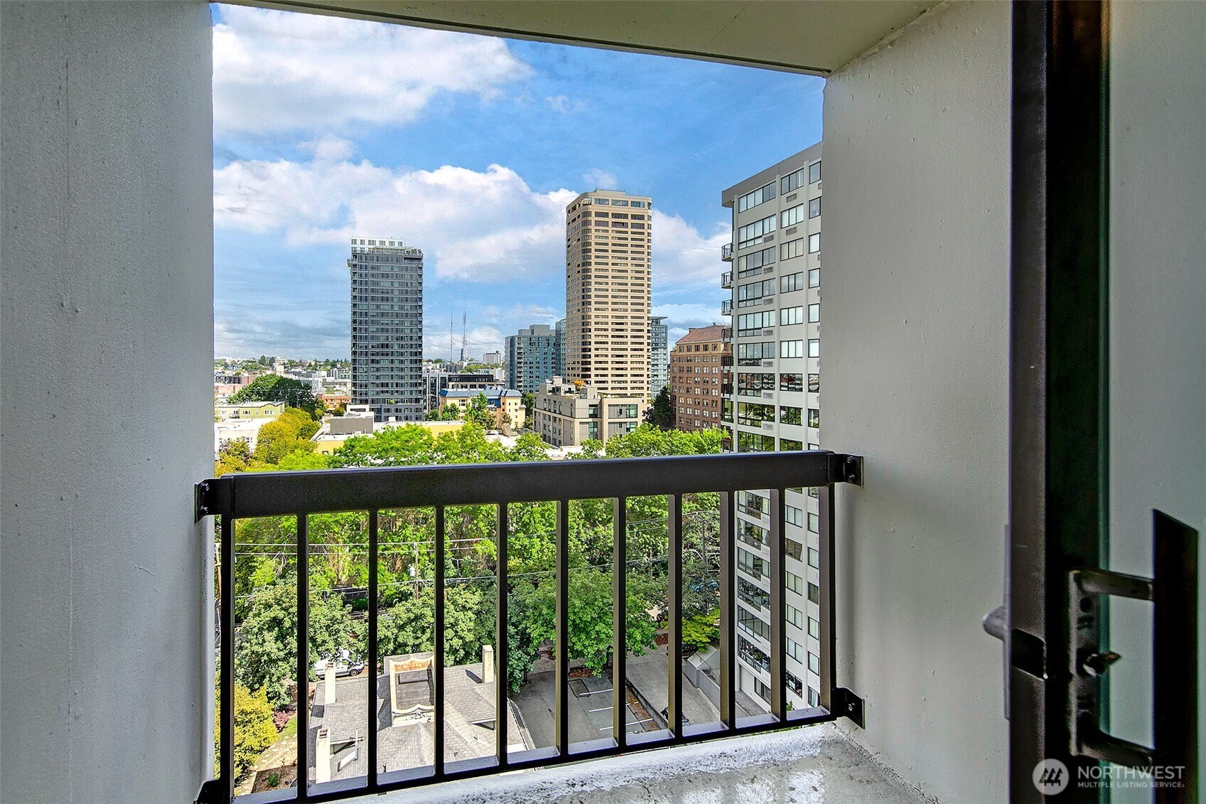 1101 Seneca Street, Unit 1301 Seattle, WA 98101 - Photo 22 of 40 a view of a balcony with city view