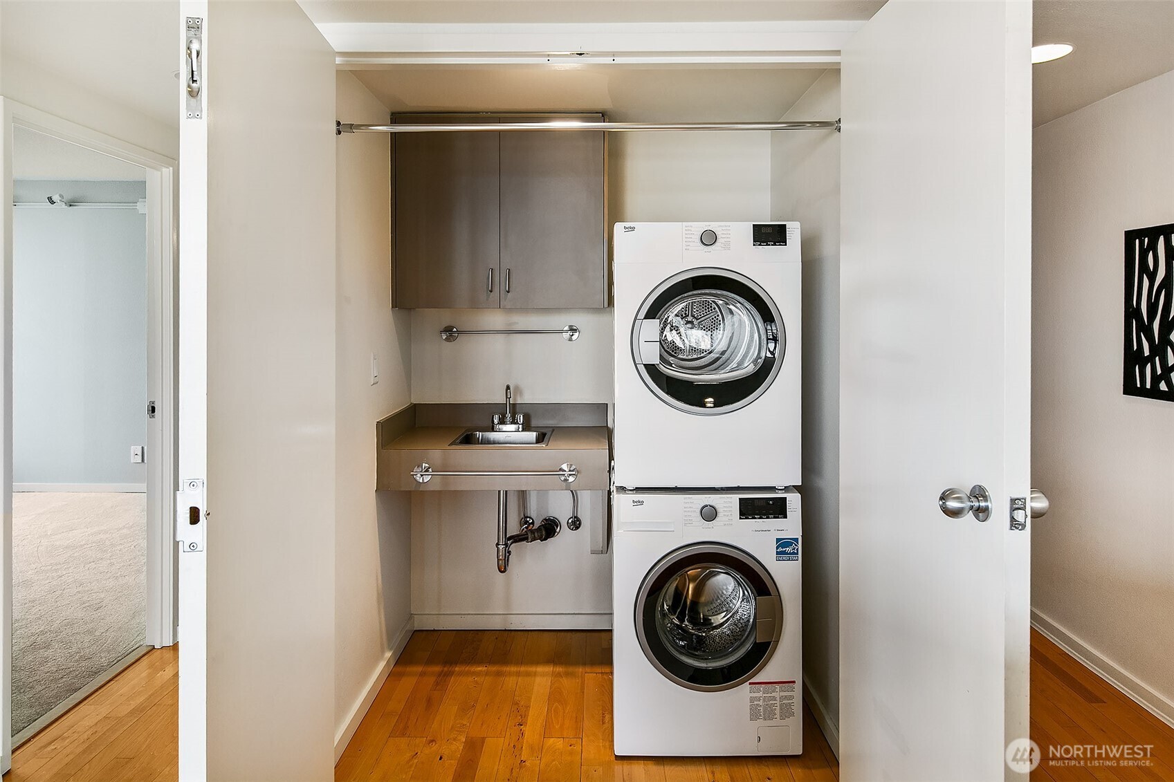 1101 Seneca Street, Unit 1301 Seattle, WA 98101 - Photo 23 of 40 a utility room with sink dryer and washer