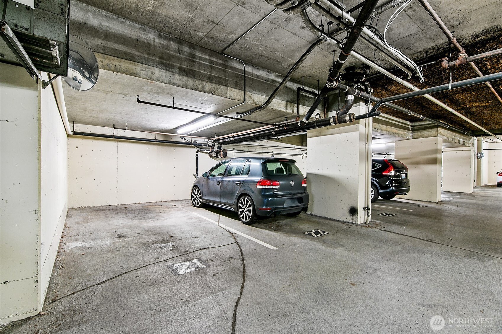 1101 Seneca Street, Unit 1301 Seattle, WA 98101 - Photo 25 of 40 a view of parking garage with cars parked
