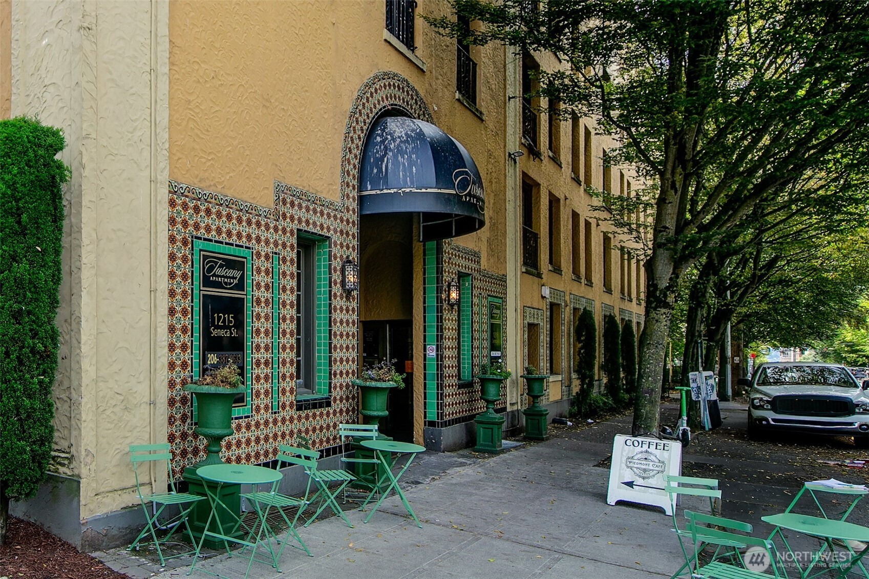 1101 Seneca Street, Unit 1301 Seattle, WA 98101 - Photo 39 of 40 a front view of a building with a garden